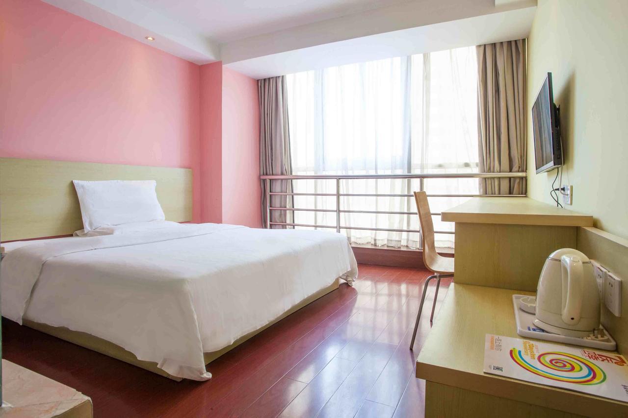 7Days Inn Lingshui Beidou Road Номер фото